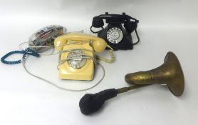 Three various telephones including 1950's black bakelite telephone.