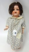 Heubach Kopplesdorf doll with painted bisque head, sleeping blue eyes, jointed comp body, marked