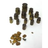 Collection of various brass bankers metric weights also some gold weights.