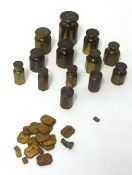 Collection of various brass bankers metric weights also some gold weights.