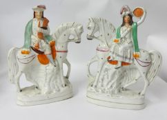 Two figures, a pair of Highland Horseback Riders, 29cm