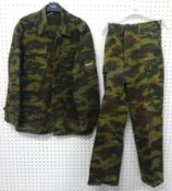 A Russian Woodland camouflage jacket and trousers