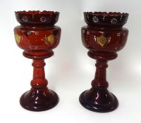 Pair of Victorian ruby glass lustres with enamelled decoration (no drops), height 36cm.