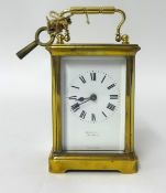Brass cased carriage clock, dial inscribed 'Goulding & Co Plymouth' , height 14.5cm.