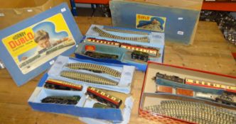 Three Hornby Dublo OO gauge train sets also various track and accessories.