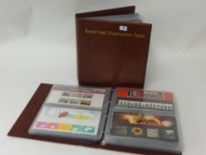 Two albums, Royal Mail Presentation packs, various Christmas and other First Day Covers, various