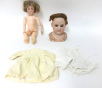 Armand Marseille bisque dolls head with sleep eyes, impressed marks A21/2M also small HK doll with