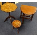 A small mahogany tea table, two small occasional tables, one with marquetry inlay of bird design