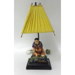 Royal Doulton figure 'Calumet', HN 1428 set as a table lamp, damaged overall height 42cm.