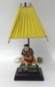 Royal Doulton figure 'Calumet', HN 1428 set as a table lamp, damaged overall height 42cm.