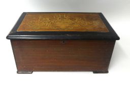 A Victorian music box stamped English Patent, No 11388 D.Reichspatent, L' Universelle, trade made