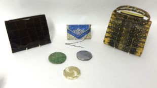 Snakes skin handbag, another bag and evening purse, three compacts including Shagreen style