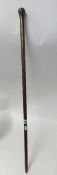 Hardwood walking stick having intricate pique inlaid decoration, length 88cm.