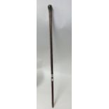 Hardwood walking stick having intricate pique inlaid decoration, length 88cm.