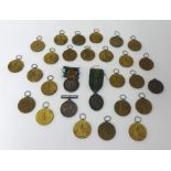 Collection of various coins and medals.