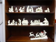 A large collection of porcelain Snow Babies, by Department, approximately 84.