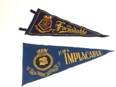 Two pennants, from WW II aircraft carriers HMS Implacable and HMS Formidable, each carrying the