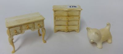 Two pieces of small ivory/bone furniture t/w carving of a Siberian cat (3).