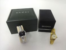 A modern Ladies Gucci Watch and a Sekonda Watch (both boxed).
