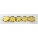 A 9ct gold bracelet, mounted with seven 1/2 sovereigns, 1902, 1906 x 2, 1908, 1910 x 3, weight 36