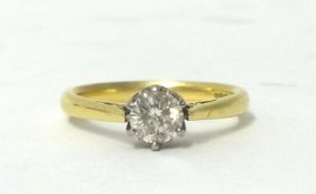 An 18ct gold single stone diamond ring, claw set with a brilliant cut stone weighing approximately