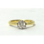 An 18ct gold single stone diamond ring, claw set with a brilliant cut stone weighing approximately