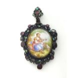 A late 19th century Austro-Hungarian metal pendant, the central porcelain portrait set within an