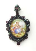 A late 19th century Austro-Hungarian metal pendant, the central porcelain portrait set within an