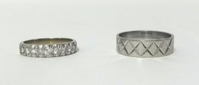 An 18ct white gold and diamond half eternity ring, set with brilliant cut diamonds, size J and an