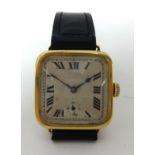 An Art Deco 18ct gold square gentlemans wristwatch, the Stauffer & Co. Peerless movement numbered