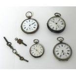 A continental silver open face key wound pocket watch, lacking glass, two other silver pocket