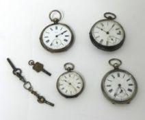 A continental silver open face key wound pocket watch, lacking glass, two other silver pocket