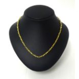 A continental unhallmarked gold abstract necklace, composed of openwork textured panels, length 90
