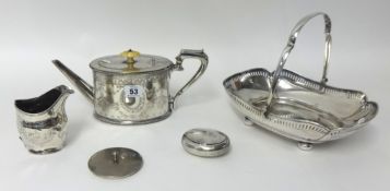 A silver tobacco box, Birmingham 1911, of oval form, inscribed, a George III silver milk jug,