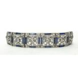 An Edwardian synthetic sapphire and diamond panel link bracelet, circa 1910, composed of six