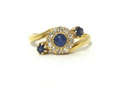 A Victorian gold, sapphire and diamond cluster ring, the central cluster set on a twist with