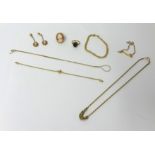 A 9ct gold rope twist necklace, a 9ct gold curb link bracelet, a diamond set bracelet and other