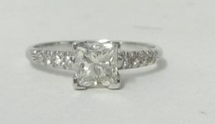 A 14ct white gold and diamond single stone ring, claw set with a princess cut stone weighing