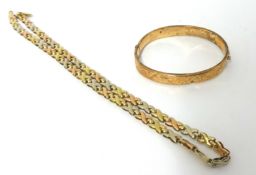 A 9ct three colour gold necklace, composed of "X" links, and a 9ct gold hinged bangle, gross