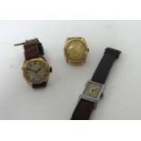 Titus, Geneve, a 9ct gold gentlemans wristwatch, Chester 1943, gilt dial, metal bracelet, a 9ct gold