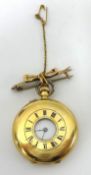 An Edwardian 18k gold half hunter ladies keyless wound pocket watch, the white enamel dial with