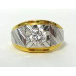 A gentlemans dress ring, set with a paste stone, stamped 14kt, size X 1/2, weight 10.8 grams.