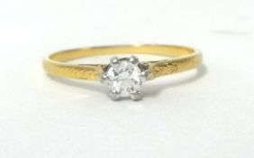 A single stone diamond ring, claw set with an old cut brilliant stone, weighing approximately 0.