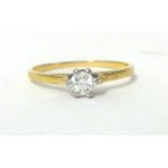 A single stone diamond ring, claw set with an old cut brilliant stone, weighing approximately 0.