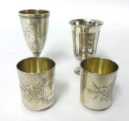 A silver pair of Russian vodka cups, assay master Anatoly Artsybashev, Moscow 1890, with engraved