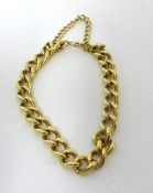 An 18ct gold curb link bracelet, London 1977, with bolt ring clasp, weight 43 grams.