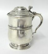 A silver mustard pot, by Mappin & Webb, London 1918, of lidded baluster tankard form, clear glass