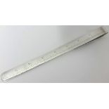 An Edwardian silver Etiquette ruler, by William Hornby, London 1903, engraved with an 8 inch ruler