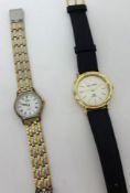 A contemporary ladies Hermes style dress watch and a contemporary Sergio Valente wrist watch (2)