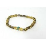 An early Victorian gold bracelet, composed of alternate engraved panels and twist links, turquoise